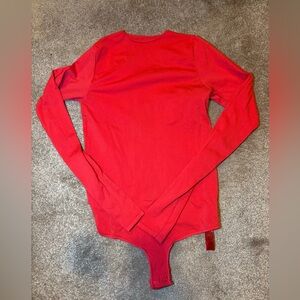 Skims essential bodysuit
Red NWOT S/M